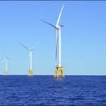 Revolution Wind turbines stand stranded off Rhode Island as the Trump administration orders a nearly completed project stopped, weaponizing national security against clean energy. (Interior Department photo)