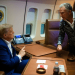 Steve Witkoff and Donald Trump speaking aboard Air Force One