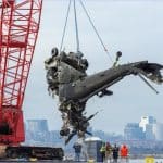 Crane recovers wreckage of Army Black Hawk helicopter from Potomac River after January 2025 mid-air collision near Reagan National Airport