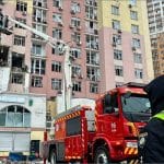 Kyiv apartment building destroyed Russian missile attack December 2025 firefighters Ukraine