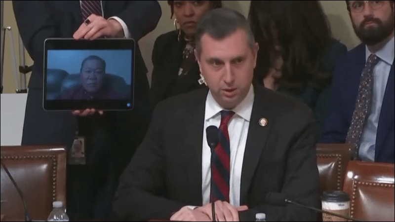 Rep. Seth Magaziner and tablet showing deported veteran Sae Joon Park on Zoom during House hearing on immigration