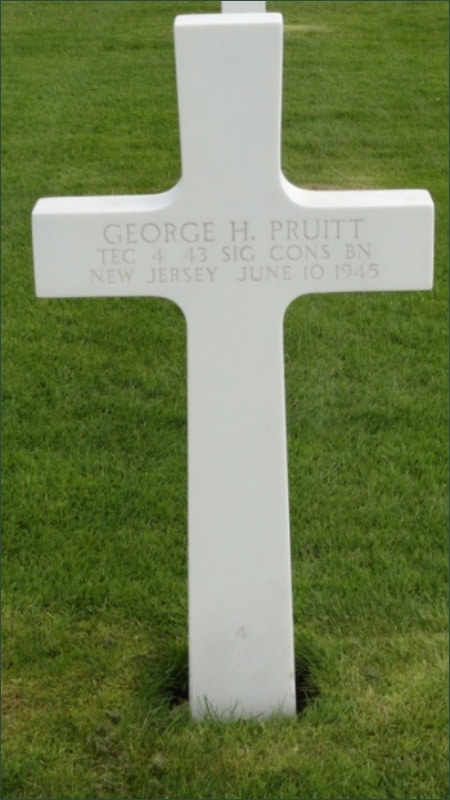 White marble cross grave marker for Technician Fourth Class George H Pruitt at Netherlands American Cemetery Margraten Plot L Row 4 Grave 4