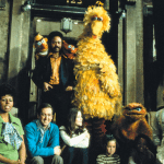 Original Sesame Street cast with Big Bird, Bert, Ernie, and human cast members on the stoop of 123 Sesame Street, 1969 promotional photo