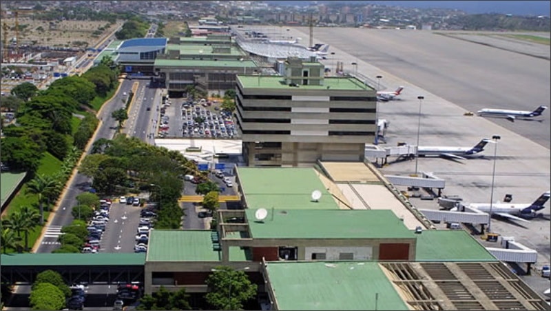 Aerial view of Simón Bolívar International Airport in Maiquetía Venezuela showing terminal buildings runways and parked aircraft