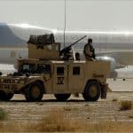 Air Force One lands at Al-Asad Air Base in Iraq on September 3, 2007, as Navy SEALs provide security