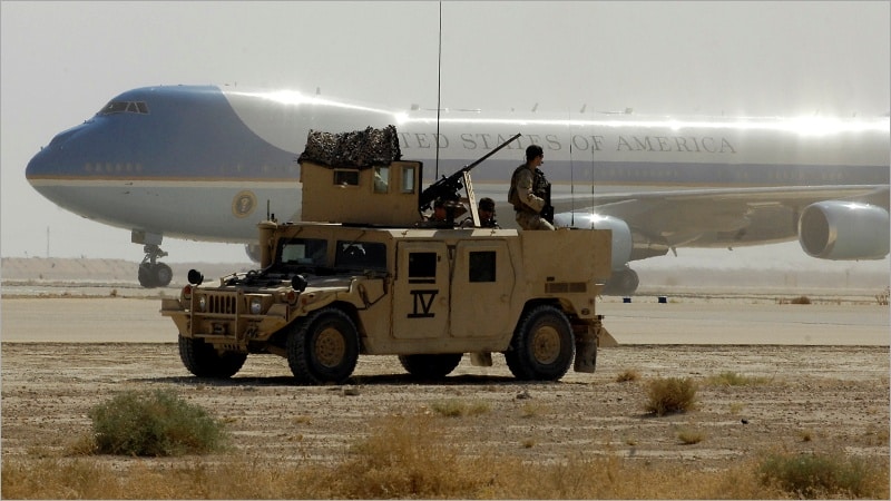 Air Force One lands at Al-Asad Air Base in Iraq on September 3, 2007, as Navy SEALs provide security