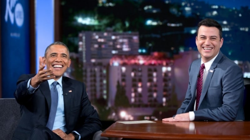 President Barack Obama laughs with host Jimmy Kimmel during a taping of Jimmy Kimmel Live in Los Angeles