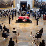 The flag-draped casket of Rep. John Lewis in the U.S. Capitol Rotunda during a socially distanced ceremony on July 27, 2020