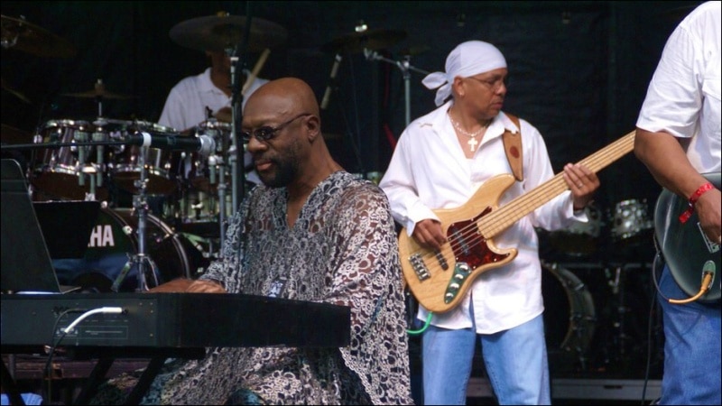 Isaac Hayes performing at a keyboard on stage with his band on June 3, 2007, one year before his death