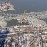 Aerial view of Gateway Project construction in the frozen Hudson River showing cranes, ground stabilization platforms, and the 12th Avenue Access Shaft, January 2026
