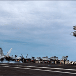 F/A-18E Super Hornet lands on the flight deck of the USS Gerald R. Ford, March 17, 2026