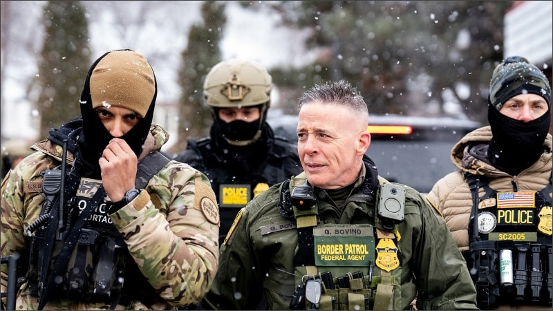 Border Patrol Commander Greg Bovino with BORTAC officers at a Minneapolis gas station, January 2026