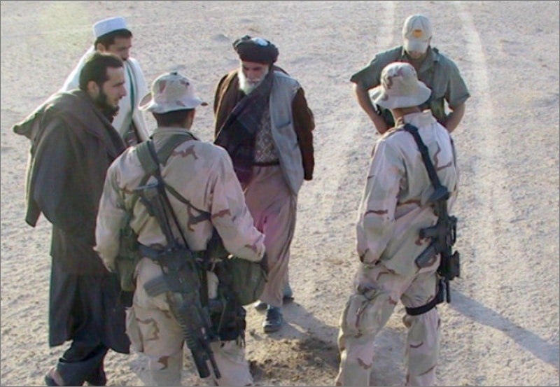U.S. Army Special Forces meeting with Afghan resistance fighters in October 2001