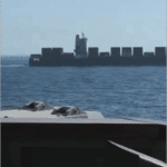 Iranian cargo ship Touska seen from U.S. Navy vessel in Gulf of Oman before being fired on and boarded April 19, 2026