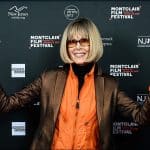 E. Jean Carroll smiling with her arms outstretched at the 2025 Montclair Film Festival