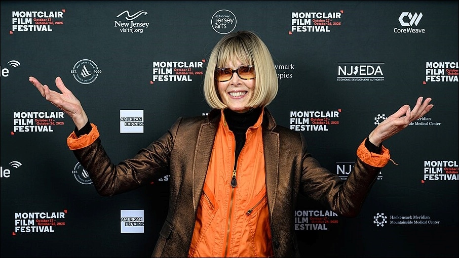 E. Jean Carroll smiling with her arms outstretched at the 2025 Montclair Film Festival