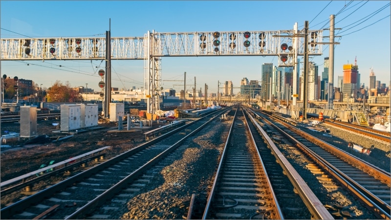 Long Island Rail Road tracks heading toward Manhattan skyline at Harold Interlocking and Sunnyside Yard