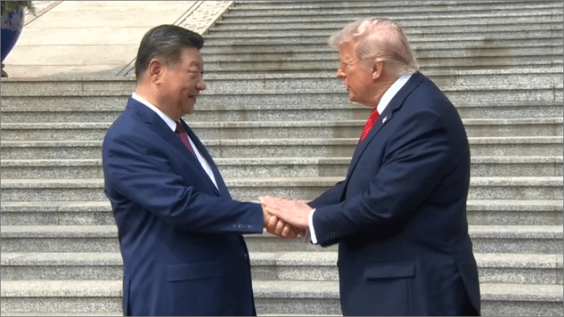 Chinese President Xi Jinping shakes hands with President Donald Trump on stone steps during May 2026 Beijing summit