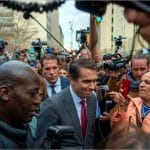 Todd Blanche surrounded by reporters outside Manhattan Criminal Courthouse in 2023
