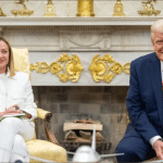 Giorgia Meloni and Donald Trump seated by the Oval Office fireplace during a 2025 White House meeting