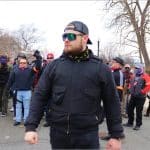 Ethan Nordean leads Proud Boys members past the US Supreme Court on January 6, 2021