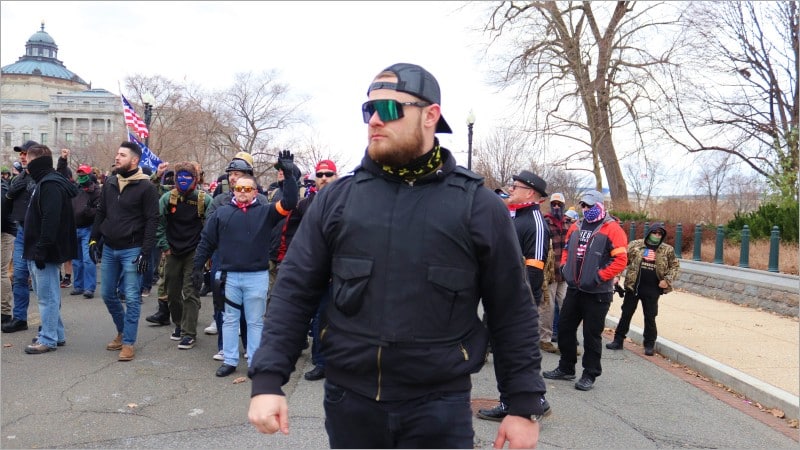 Ethan Nordean leads Proud Boys members past the US Supreme Court on January 6, 2021