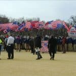 Masked Patriot Front members hold American and Confederate flags on the National Mall at the 2026 March for Life in Washington DC