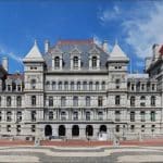 New York State Capitol building in Albany with its front plaza on a clear day