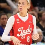Sophie Cunningham of the Indiana Fever in a red Indy jersey during a game against the Minnesota Lynx