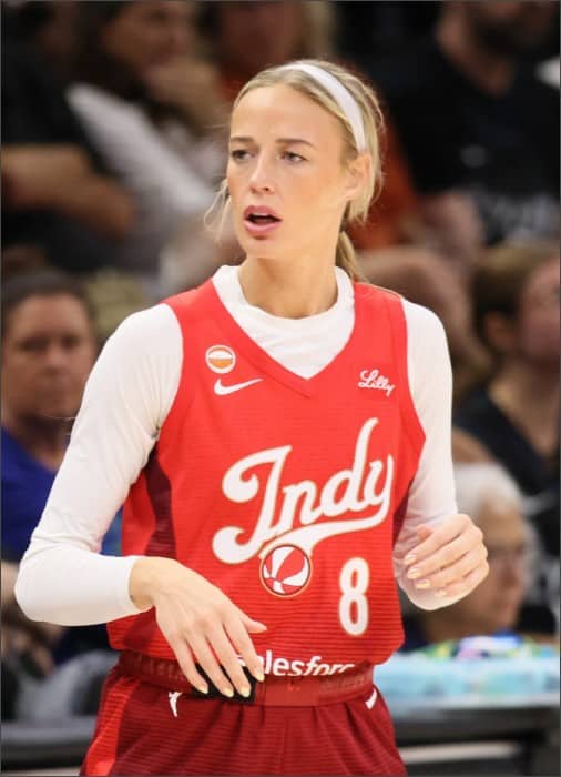 Sophie Cunningham of the Indiana Fever in a red Indy jersey during a game against the Minnesota Lynx