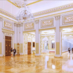 Rendering of the White House ballroom interior with gold trim, marble floors, and a presidential seal, from Trump's Supreme Court filing