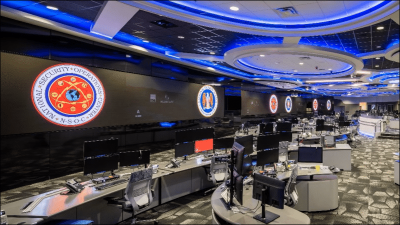 NSA National Security Operations Center watch floor at Fort Meade with monitors and agency seals