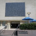 Entrance to Berkeley Law at the University of California with Benjamin Cardozo's inscription on studying the precepts of justice carved above the doors