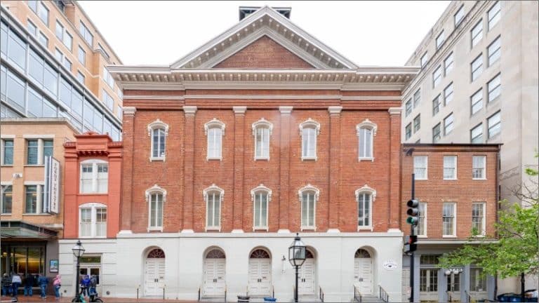 Red brick facade of Ford's Theatre on 10th Street in Washington, D.C., where President Abraham Lincoln was assassinated in 1865