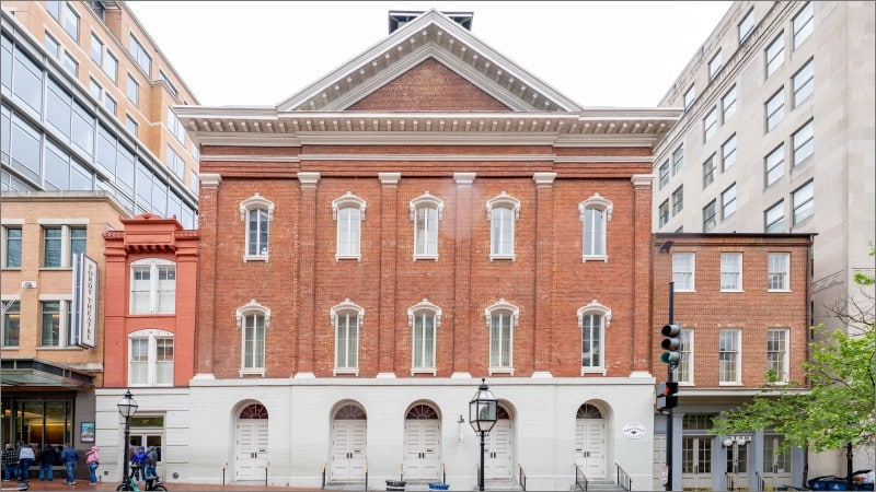 Red brick facade of Ford's Theatre on 10th Street in Washington, D.C., where President Abraham Lincoln was assassinated in 1865