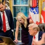 Natalie Harp leans over a laptop on Donald Trump's Oval Office desk while JD Vance looks on