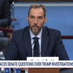 Former special counsel Jack Smith testifies at the witness table before the Senate Judiciary Committee