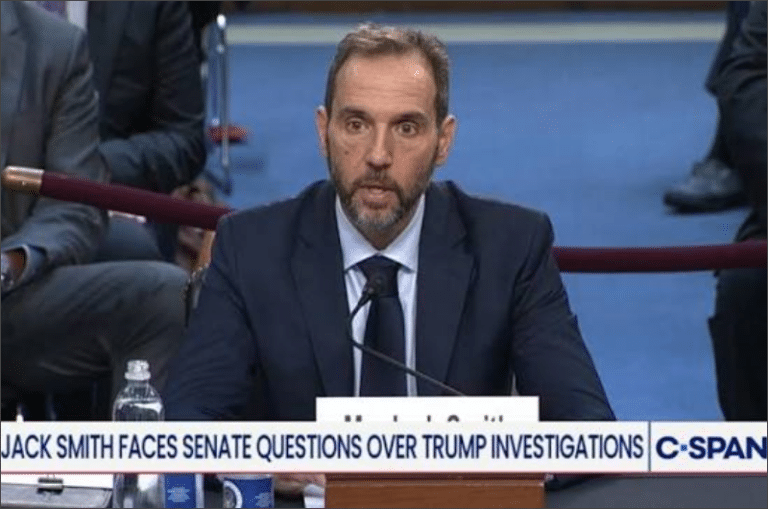 Former special counsel Jack Smith testifies at the witness table before the Senate Judiciary Committee