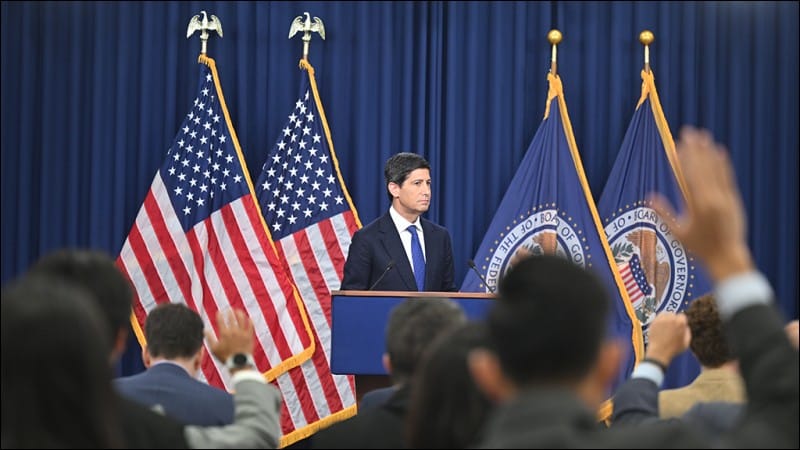 Federal Reserve Chair Kevin Warsh at the podium as reporters raise their hands at the FOMC press conference on September 16, 2026
