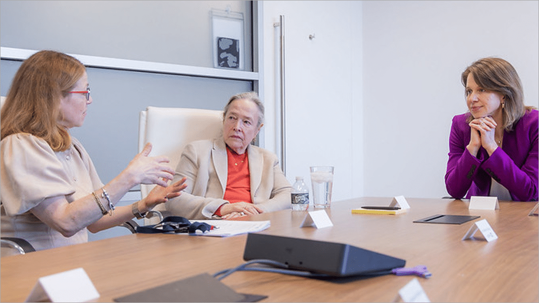 ARPA-H Director Alicia Jackson, actress Kathy Bates, and program manager Kim Steele talking around a conference table